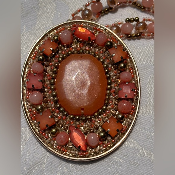 Orange beaded necklace that lands high on chest. - Picture 3 of 3
